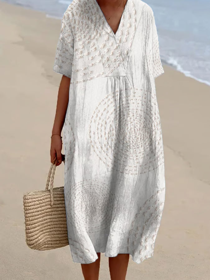 Arielle | Loose-fitting dress with circular embroidery