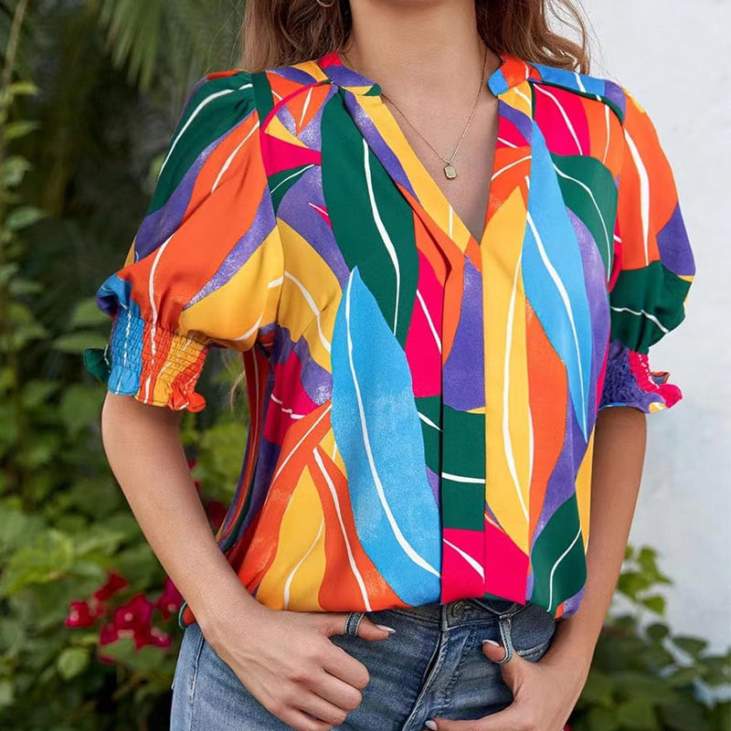 Chalia - Blouse with floral pattern and puff sleeves