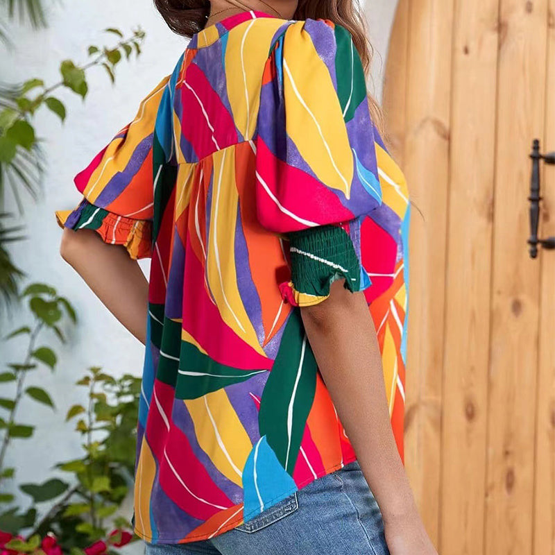 Chalia - Blouse with floral pattern and puff sleeves